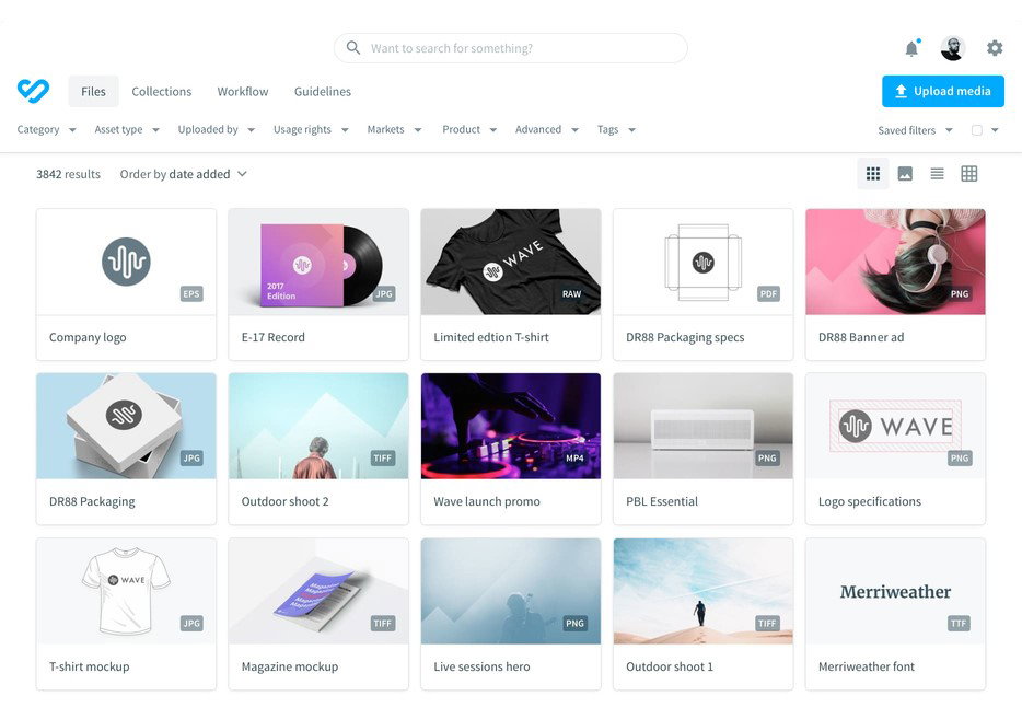 TechDogs-"Bynder: Best User Experience (UX)"-"Bynder Dashboard Displaying Digital Assets, Media Previews, And Organized Brand Files With Search And Upload Options"
