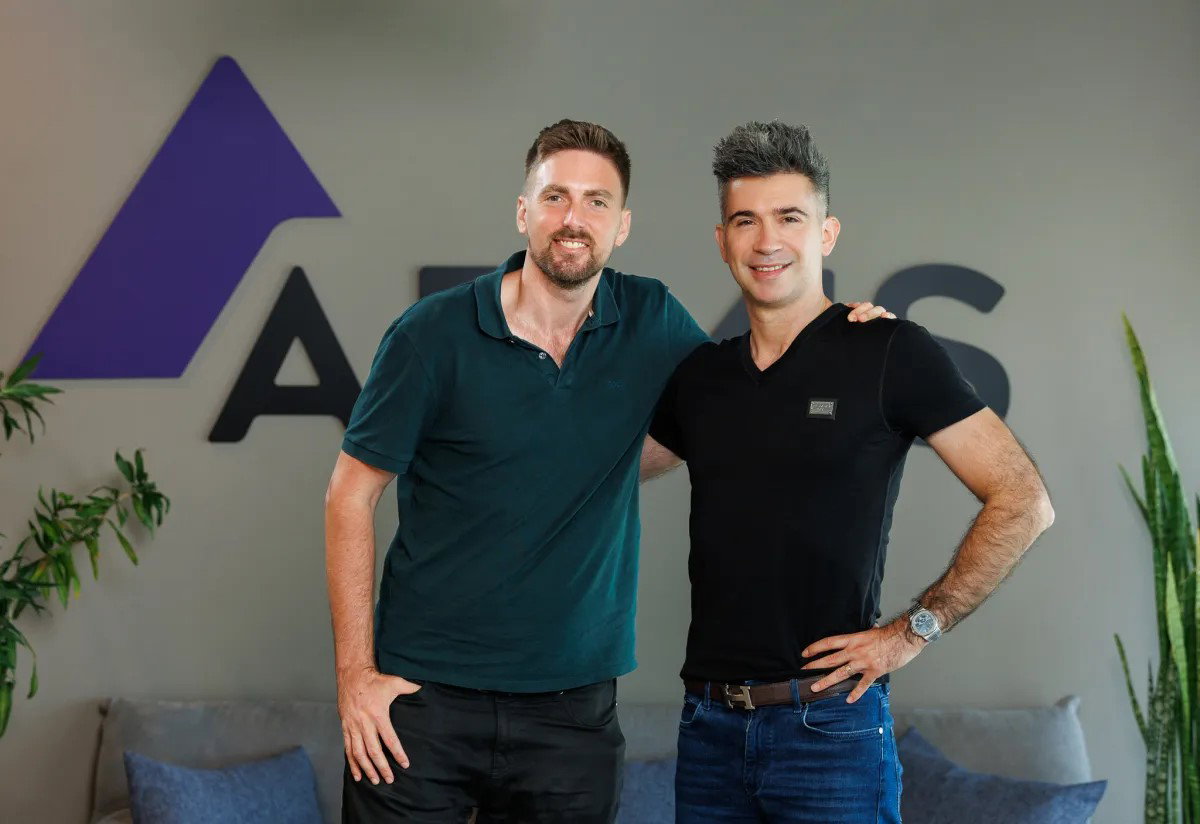 TechDogs-"ServiceNow’s $7.75B Armis Acquisition Pushes Deeper Into Cybersecurity"-"Armis CEO Yevgeny Dibrov And Co-Founder Nadir Izrael Posing At Company Office After Acquisition Announcement"