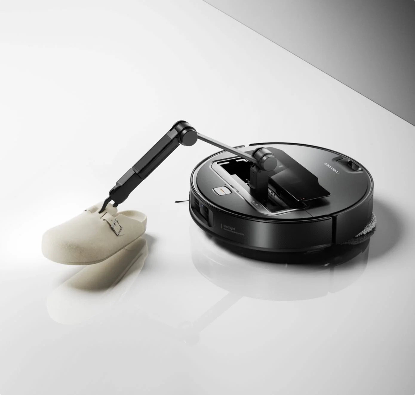 TechDogs-"Roborock: Who It’s Built For And Where It Wins"-"An Image Of Roborock's Saros Z70 And Its Extendable Arm"