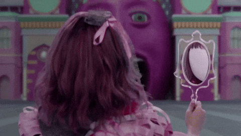 TechDogs-"What Are Faceless YouTube Channels?"-"A Gif Of A Faceless Girl Looking Back"