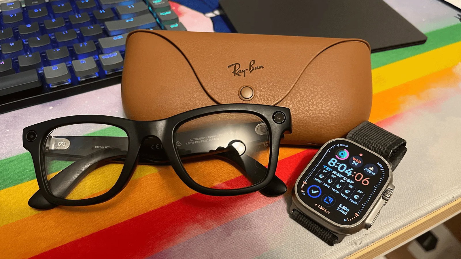 TechDogs-"Smartwatches And AI-Powered Smart Glasses"-"An Image Of Meta Ray-Ban Smart Glasses And An Apple Smartwatch"