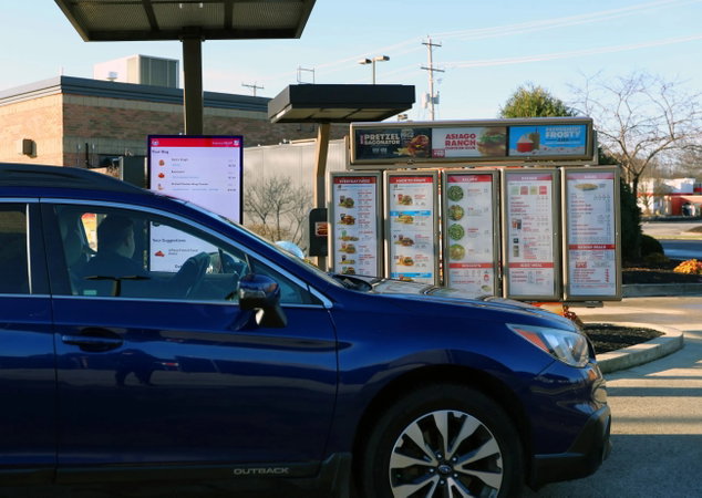 TechDogs-"How Is AI Currently Being Used In Fast Food Drive-Thru?"-"An Image Showing A Wendy’s Drive-Thru Using The Freshai Voice-Ordering Assistant"