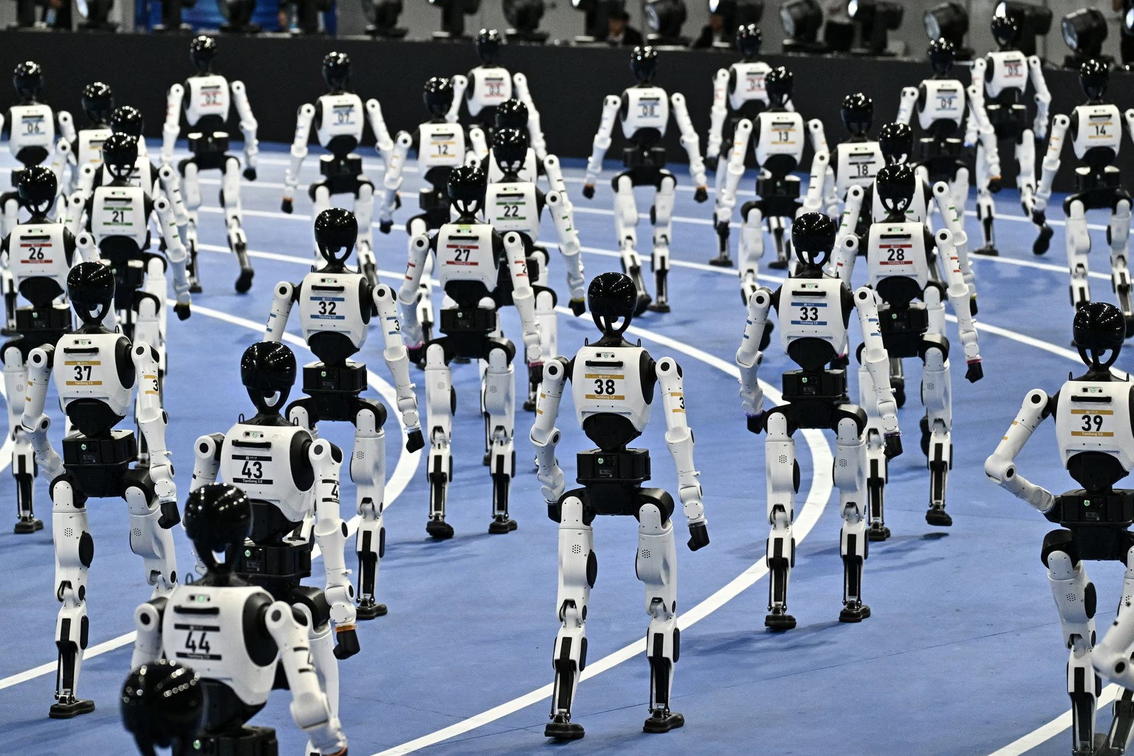 TechDogs-"Everything Happened At The World Humanoid Robot Games 2026"-"An Image Of Robots Parading During The Opening Ceremony Of The World Humanoid Robot Games 2026"