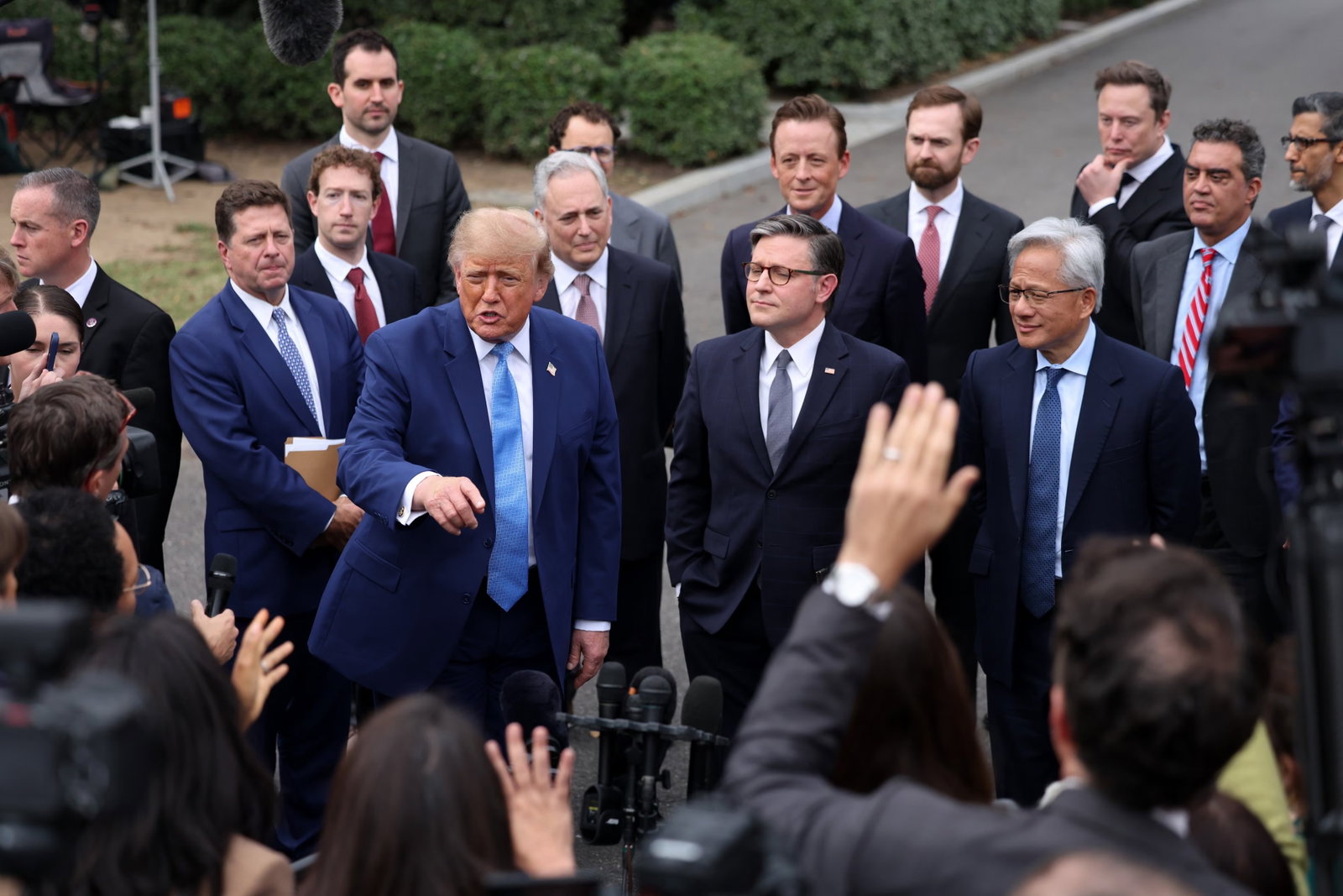 TechDogs-"What Did Donald Trump Do?"-"An Image Of President Donald Trump At The Signing Of The Executive Order "Inaugurating The Era Of Super Intelligence" Along With Satya Nadella, Mark Zuckerberg, Jensen Huang, Elon Musk, And Others"