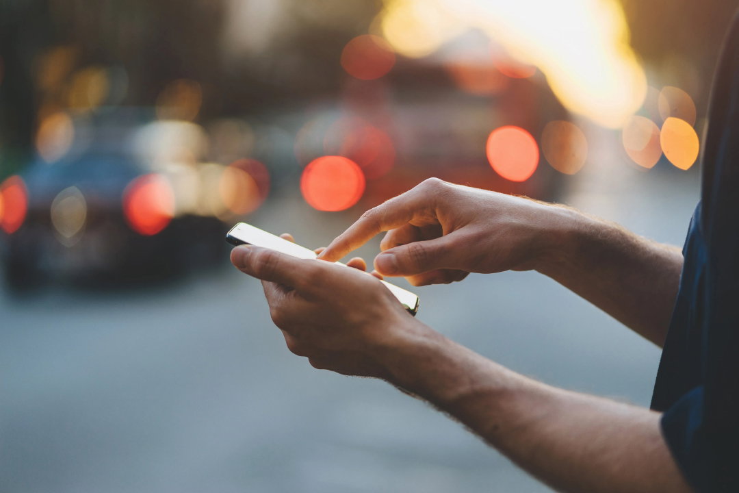 TechDogs-"An Image Of A Person Using A Smartphone As Used In Meta's News Release"