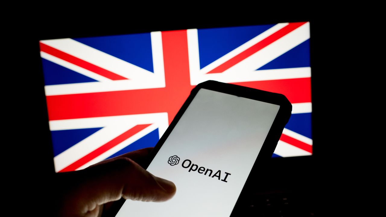 TechDogs-"An Image With OpenAI's Logo On A Phone And The UK Flag In The Background"