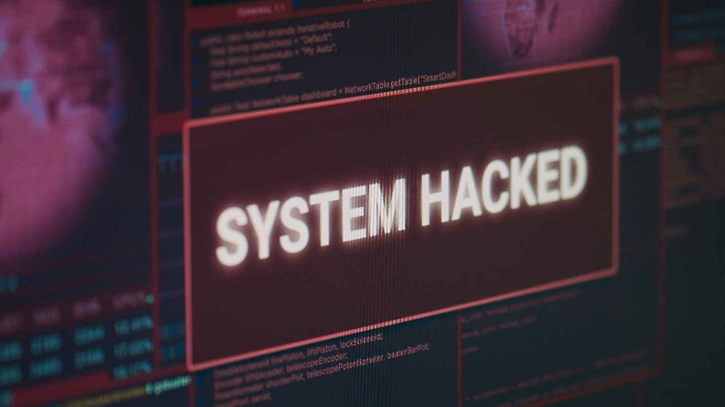 TechDogs-"An Image Showing System Hacked Pop-Up On The Screen"