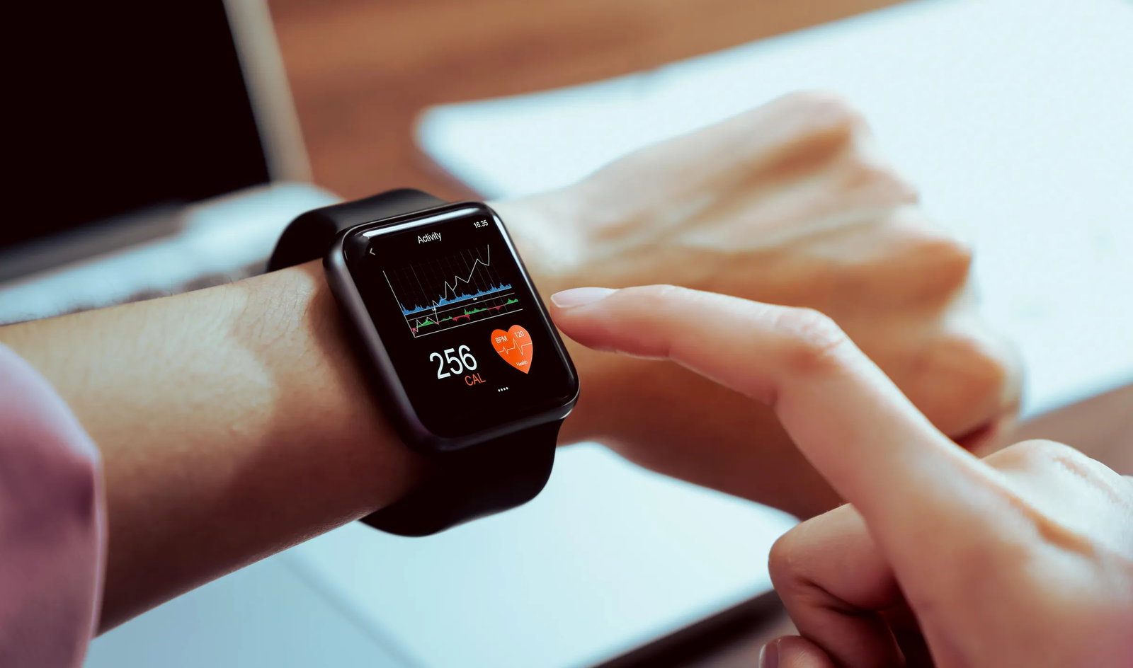 TechDogs-"How Does AI Improve The Accuracy Of Health Trackers?"-"An Image Showing Smartwatch Displaying An ECG Reading"
