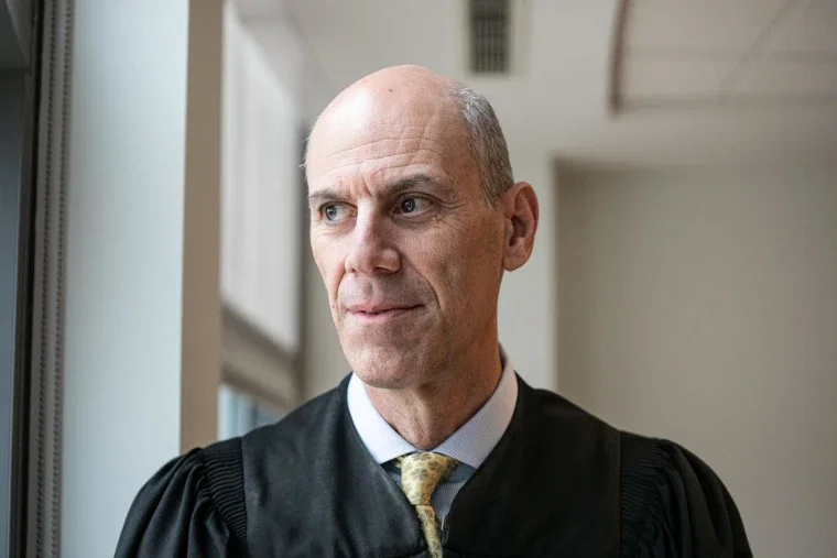 TechDogs-"Judge James Boasberg in courtroom attire looking out of a window, related to the FTC Meta antitrust case ruling"