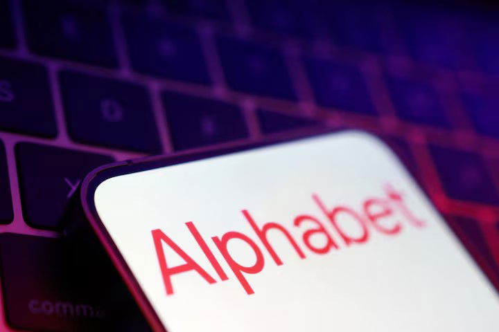 TechDogs-"Alphabet Turns To Bond Markets To Fuel Tech Expansion"-"Alphabet Logo Displayed On Smartphone Over Keyboard"