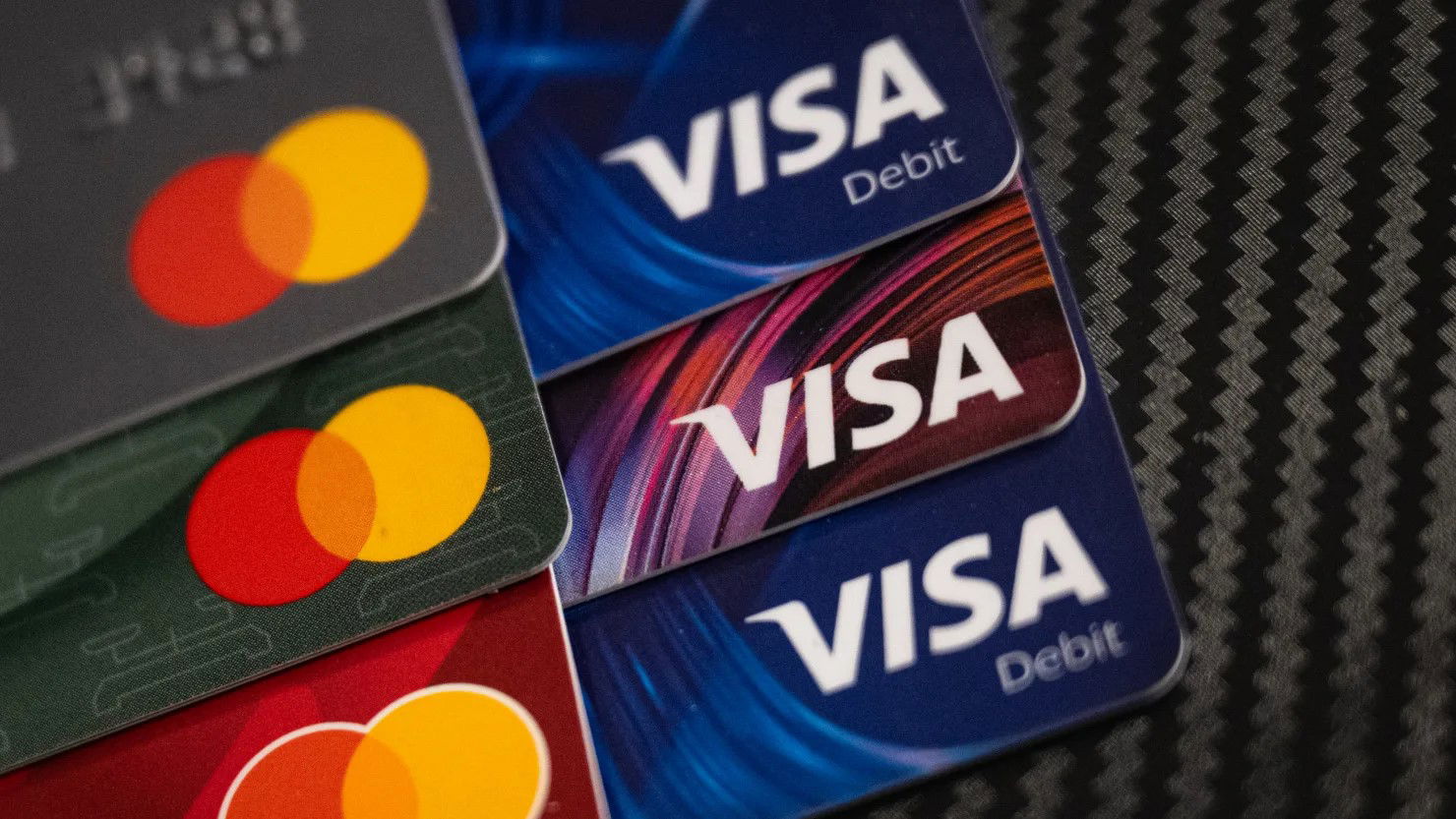 TechDogs-"What Did Visa Say About Its New AI Shopping Tool?"-"Visa And Mastercard Debit Cards Representing Digital Payments And Ai-Enabled Commerce Transactions In The Global Financial Ecosystem"