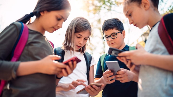 TechDogs - "An Image Showing Teenagers Using Social Media"