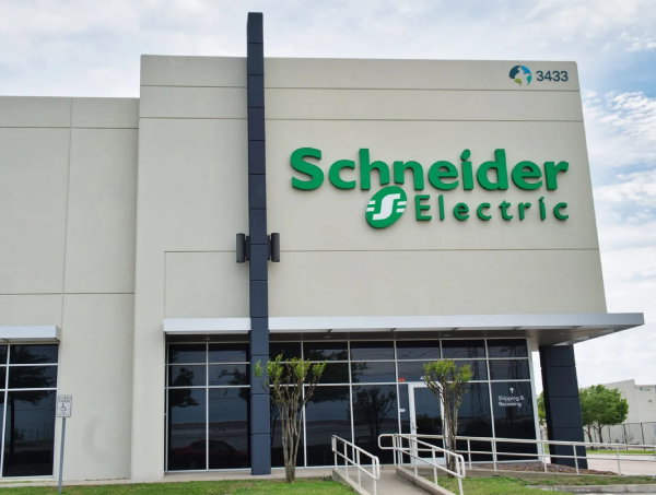 TechDogs - "An Image Showing A Building With Schneider Electric Logo"