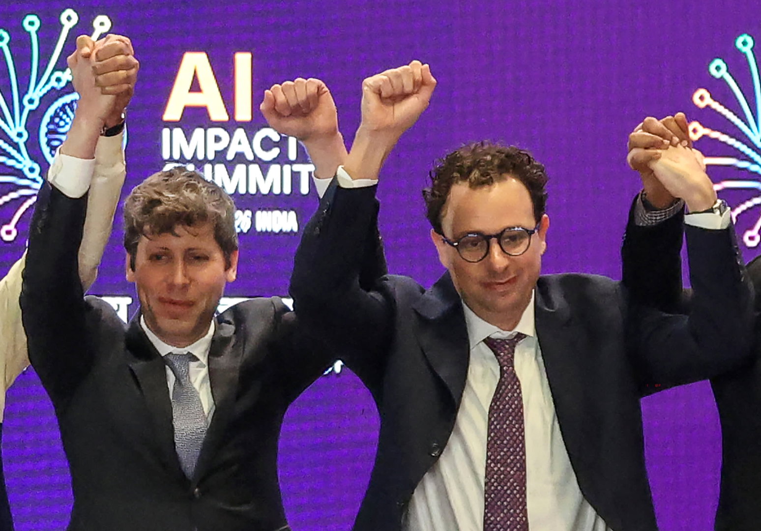 TechDogs-"An Image Of OpenAI CEO Sam Altman And Anthropic CEO Dario Amodei"