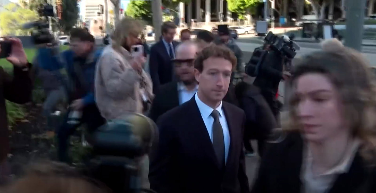 TechDogs-"An Image Of Mark Zuckerberg Attending The New Mexico Trial"