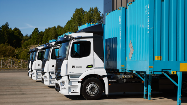 TechDogs-"Einride Electric Freight Trucks Parked With Containers Ready For Zero Emission Logistics Operations"