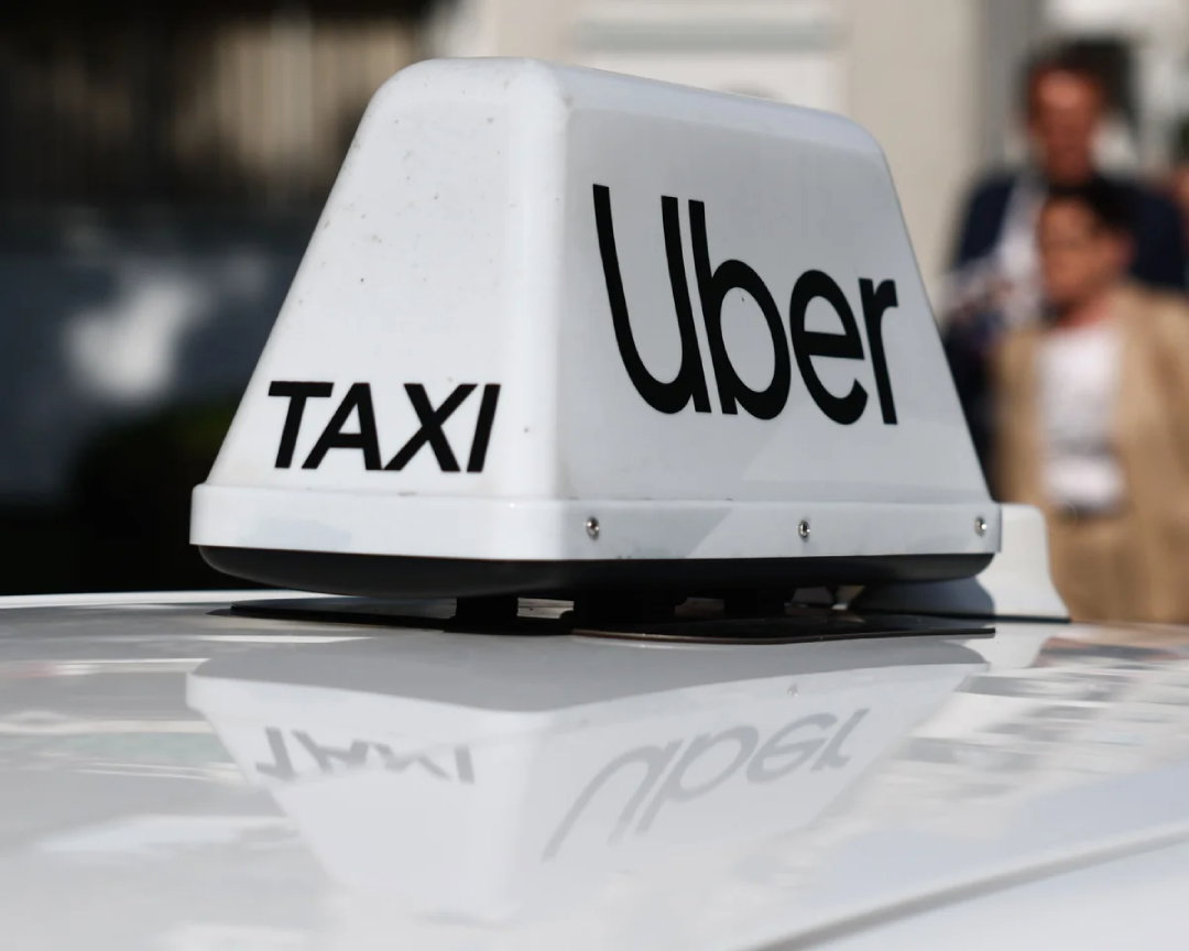 TechDogs-"An Image Of An Uber Taxi Topper"